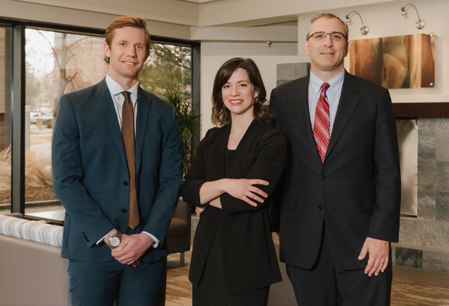 Photo of attorneys Shawn Moussou, Meghan P. Johnson and Joseph DeCaporale